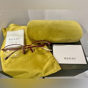 GUCCI Titanium Eyeglasses for Women Round/Oval Red